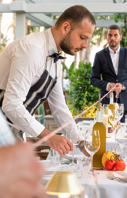 person setting the table