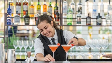 woman pouring drink